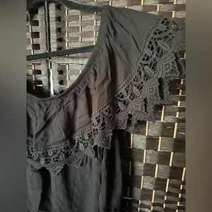 Black off the shoulder top with ruffle detail